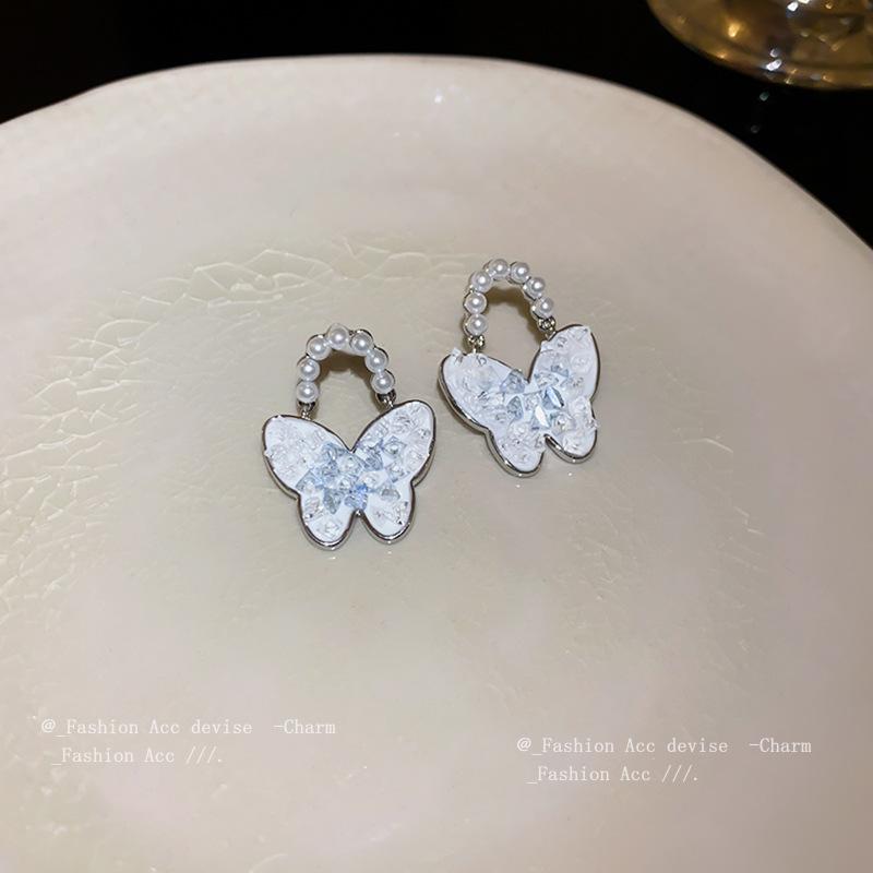 Silver needle butterfly crystal pearl earrings niche light luxury design earrings small fresh simple temperament earrings