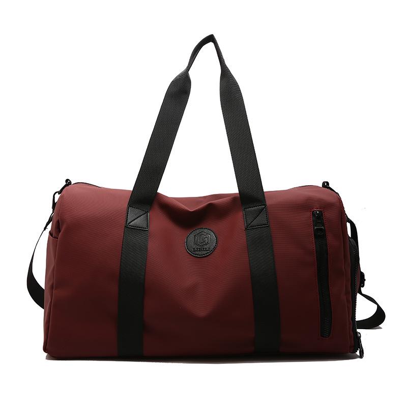 

Dual-Compartment Gym and Travel Bag for Men and Women - Large Capacity, Dry/Wet Separation, Multifunctional for Yoga and Business Trips вина червоного кольору