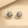New product light luxury niche black and white pearl stone stud earrings temperament simple and versatile 925 silver needle earrings women's earrings