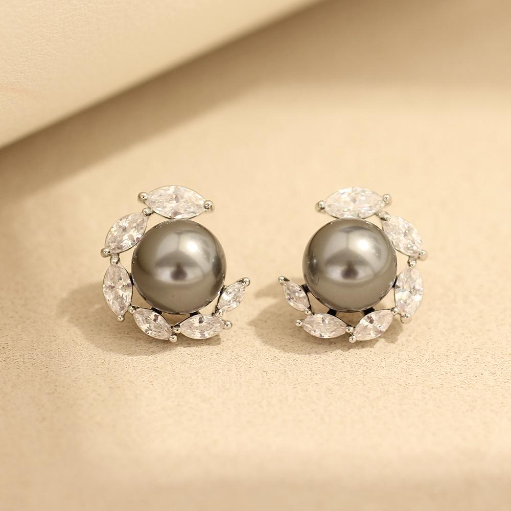 New product light luxury niche black and white pearl stone stud earrings temperament simple and versatile 925 silver needle earrings women's earrings