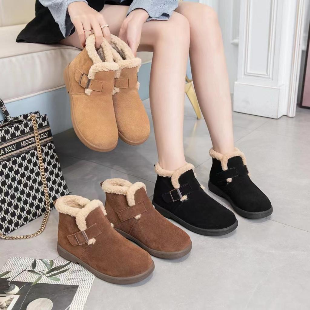 Leather snow boots women's cotton shoes autumn and winter new soft-soled piled thickened warm fluffy shoes flat short boots