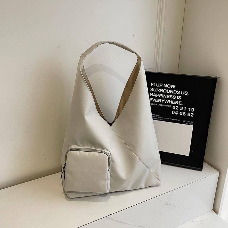 Japanese simple handbag bag women's 2025 new large-capacity niche design casual crossbody bag commuter tote bag