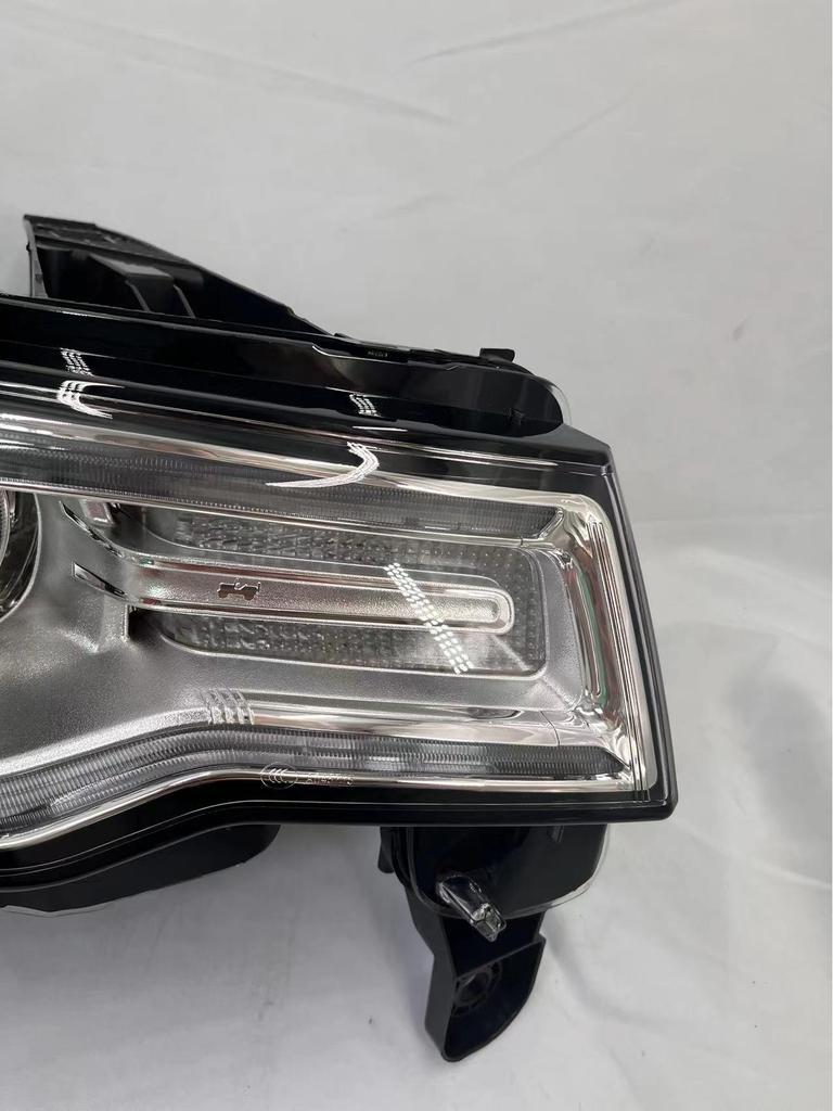 Fits 2014-2018 Jeep Grand Cherokee: OEM Headlight Half Assembly with Low Beam Lighting