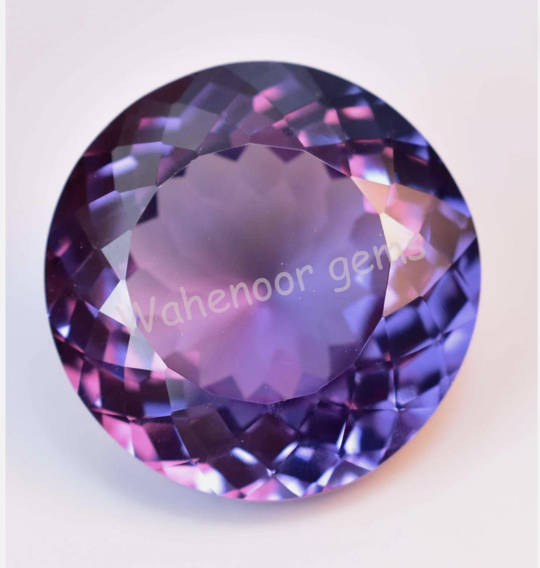 

Александрит с естественным изменением цвета 26,85 карата Потрясающий круглый сертифицированный рассыпной драгоценный камень