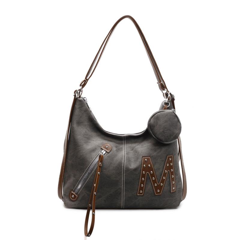 New women's bag niche fashion versatile backpack commuter shoulder messenger bag one pack three-purpose back