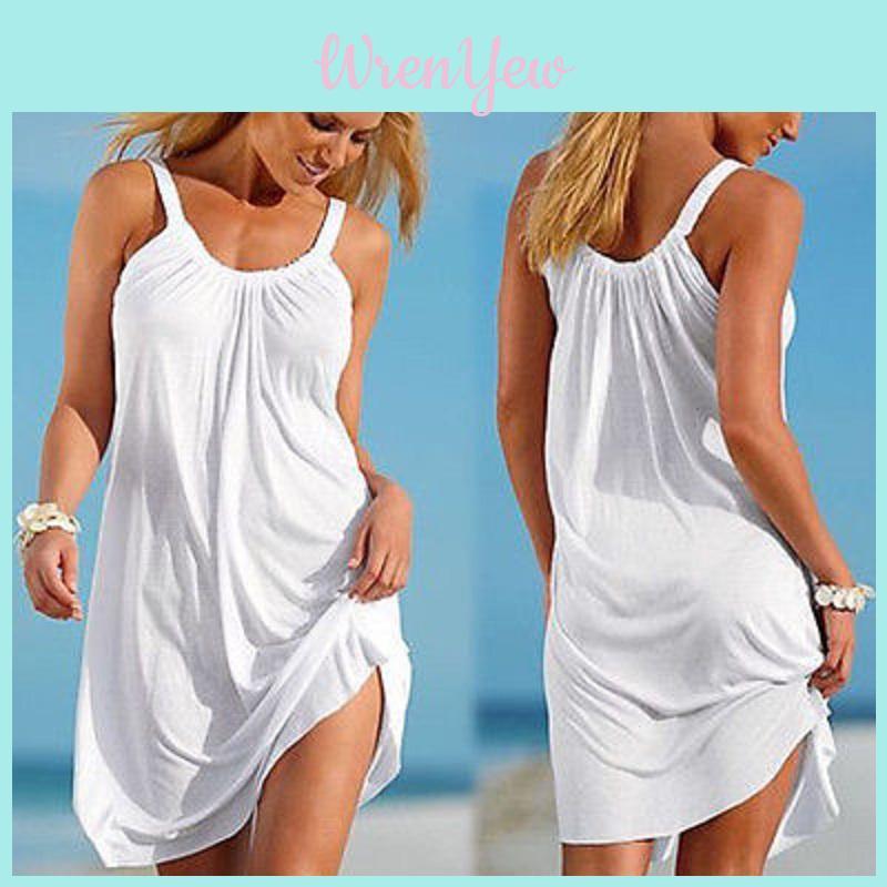 Elegant Casual Beach Dress With Stylish Straps And Unique Print Design