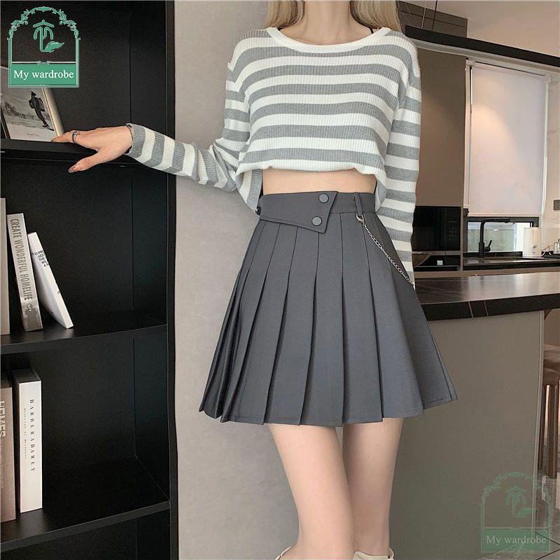 Jupe plissée tendance pour femmes, version coréenne, jupe courte trapèze, jupe taille haute polyvalente, jupe courte à chaîne boutonnée