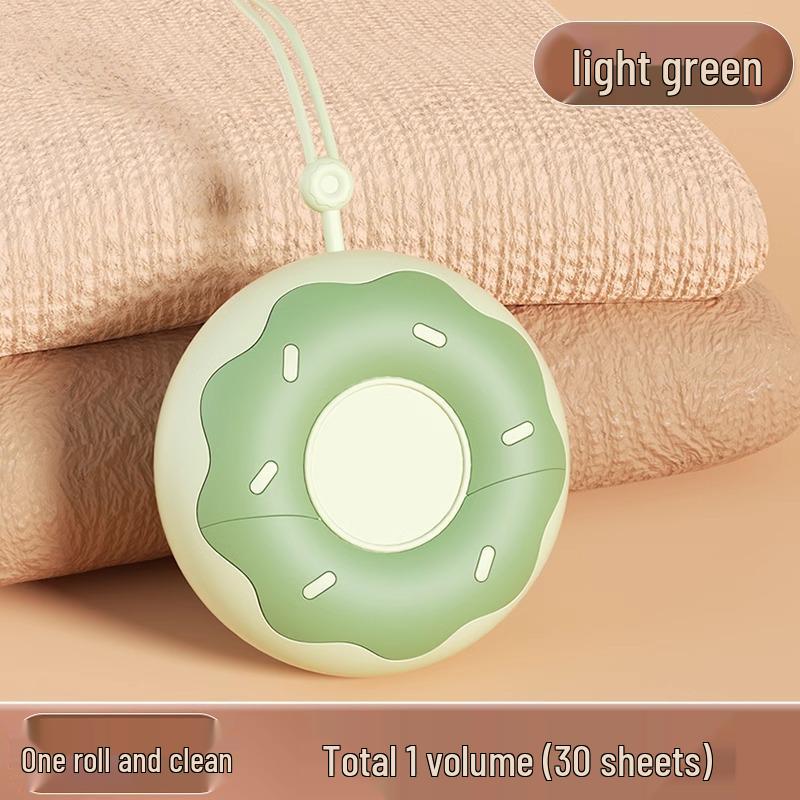 Portable Donut Lint Roller with Tearable Replacement Core for On-the-Go Hair and Lint Removal