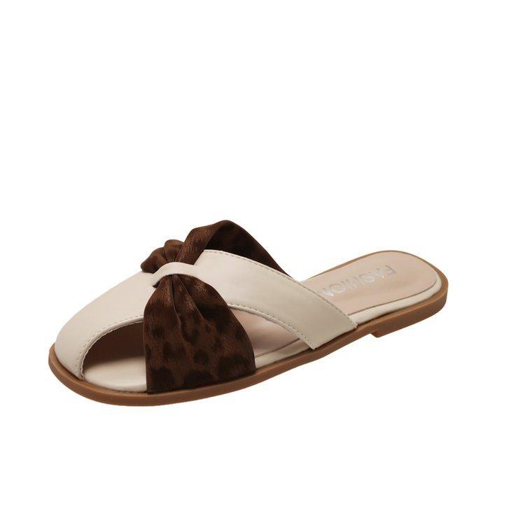 French evening breeze temperament girl campus one pedal slippers outside wearing non-slip flat bottom bag head half drag cool slippers