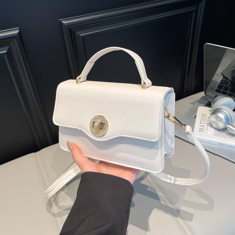

Retro elegant solid color commuter handbag women s casual autumn new fashion shoulder oblique span bag білий