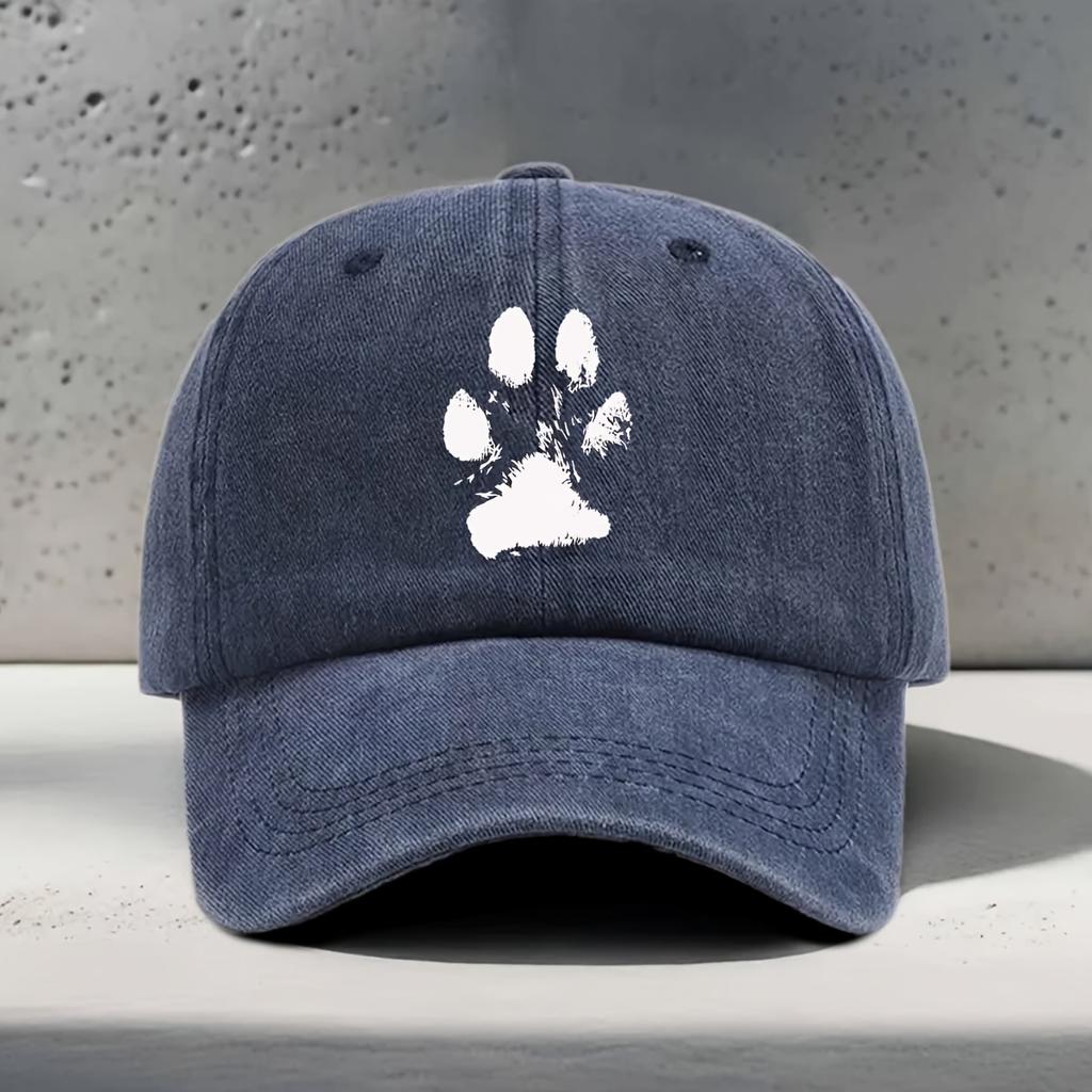 A Baseball Cap Featuring a White Blurry Paw Print Design Suitable for Outdoor Activities And Hiking with a Vintage Washed Look