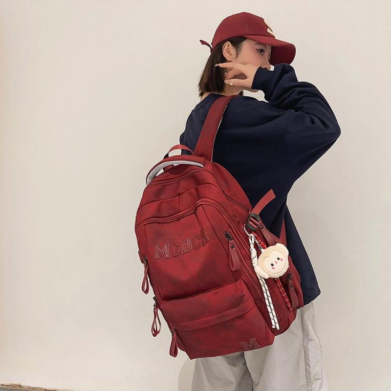 Lightweight, Ergonomic School Backpack for Male and Female Teens, Featuring Large Capacity, New Style, Double Shoulder Straps, and Back Protection.