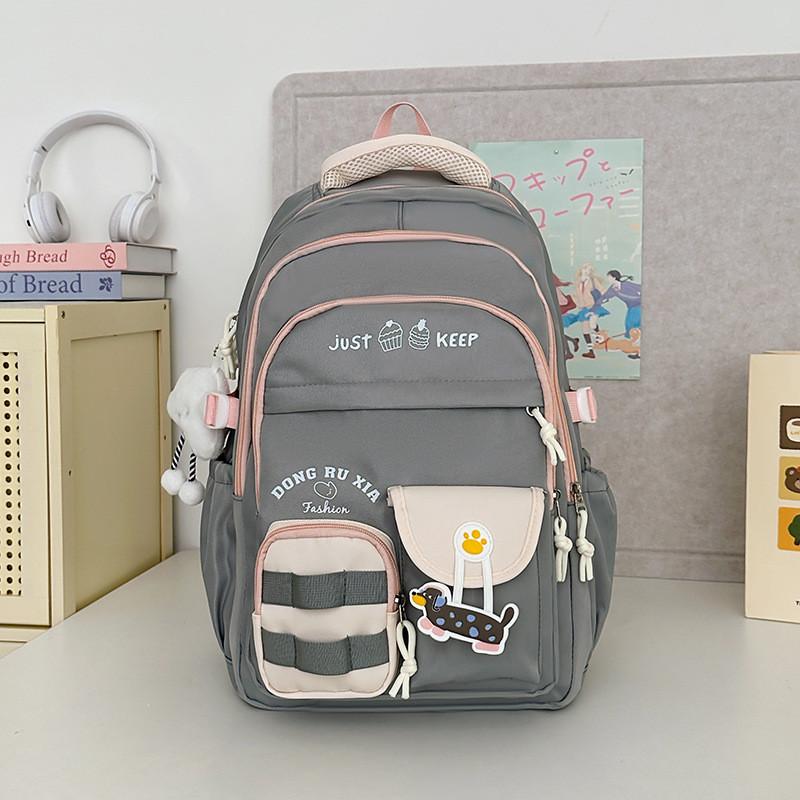 Simplified And Cake Letter Printed Student Casual Backpack With Plueh Pendant