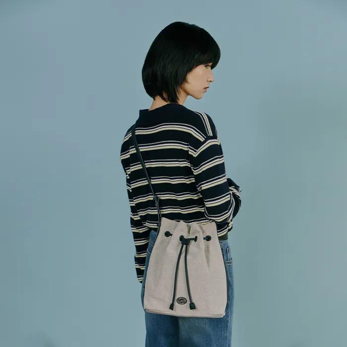VOYAGE CANVAS BUCKET BAG AS7AB244