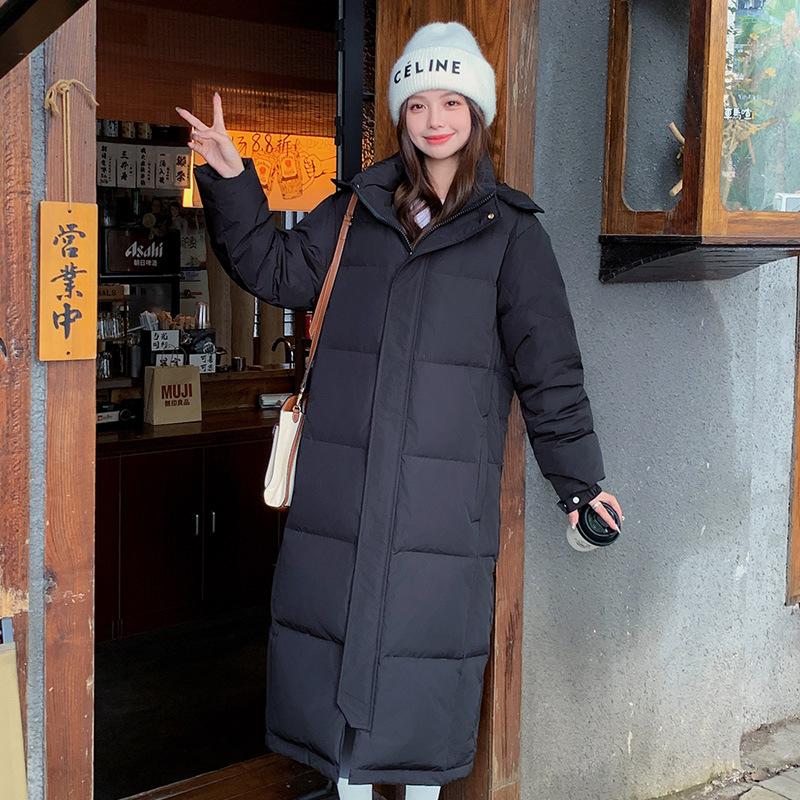 

Пуховик женский удлиненный свободный зимний с капюшоном L чёрный