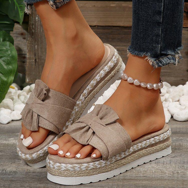 Außenhandel große Größe dicksohlige Hausschuhe Damen 2025 neue Schleife Stroh gewebt Absatz Absatz erhöhende Hausschuhe