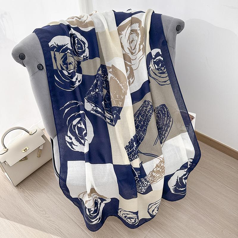 Camellia scarf fashionable versatile black and white contrasting colors air-conditioned room warm shawl travel sunscreen yarn