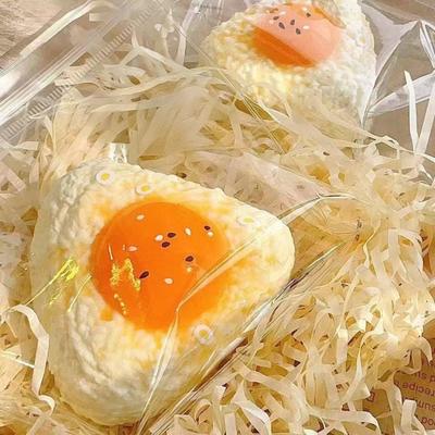 Egg Yolk Rice Ball Squeeze Toy Stress Relief Triangle Rice Ball Sensory Toy Soft Stretchy Decompression Simulated Food Fidget Toy