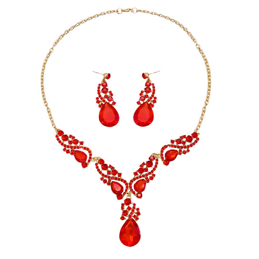 Overdreven banket smaragd ketting oorstekers set