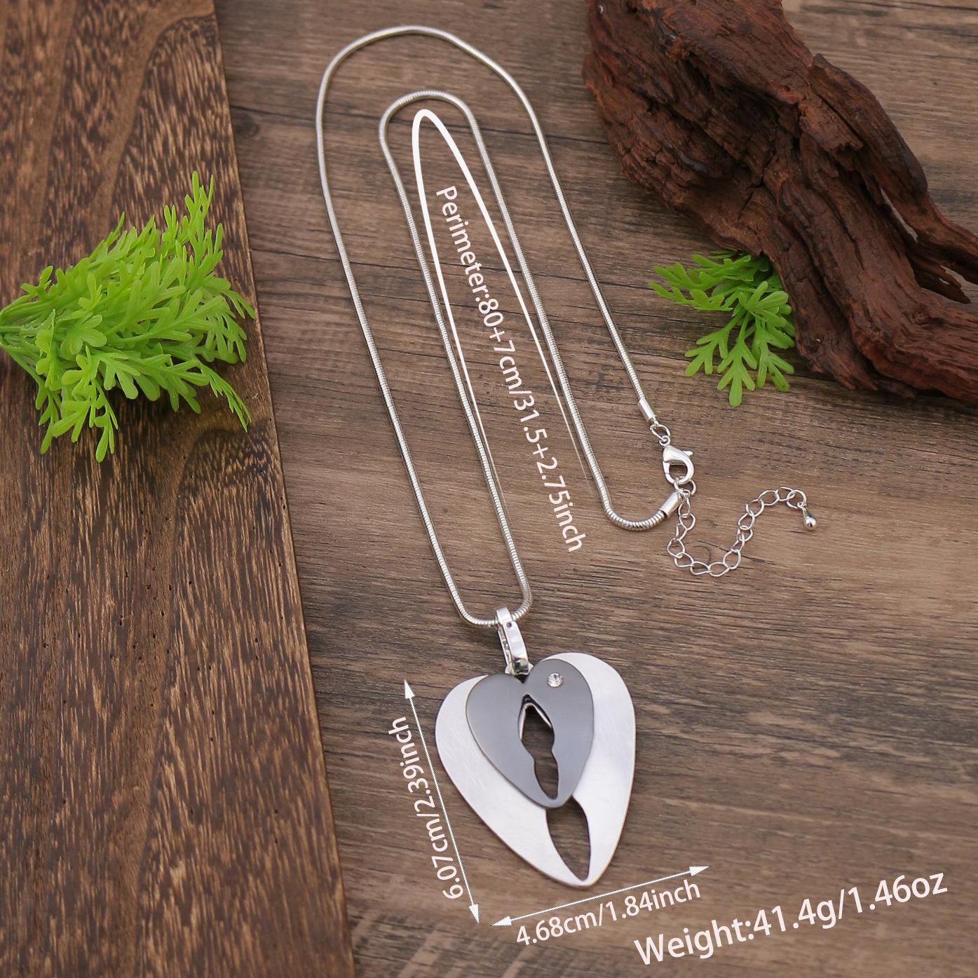 

Новая полая цепочка «змеиная кость» с длинной подвеской «любовь», женское преувеличенное универсальное длинное ожерелье, украшенное бриллиантами в форме сердца