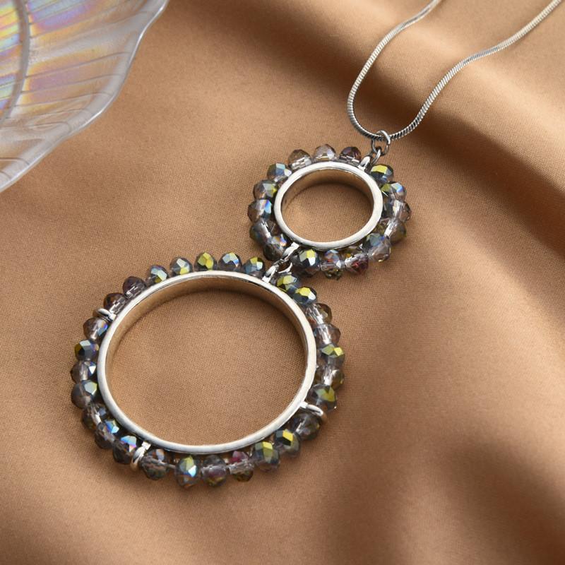 

Modern Geometric Long Necklace Made Of Durable Titanium Steel With Shimmering Austrian Crystals