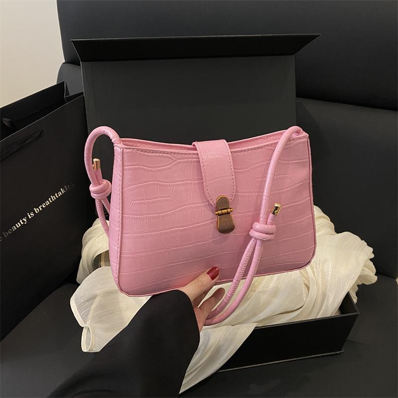 

Summer new fashion simple atmosphere versatile commuter shoulder messenger bag retro solid color armpit bag розовый