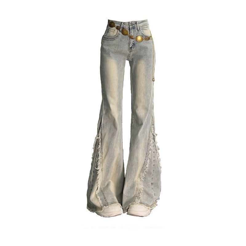 American retro micro-pull jeans women's 2026 spring and summer new rough edge splicing design sense slim and thin horseshoe pants