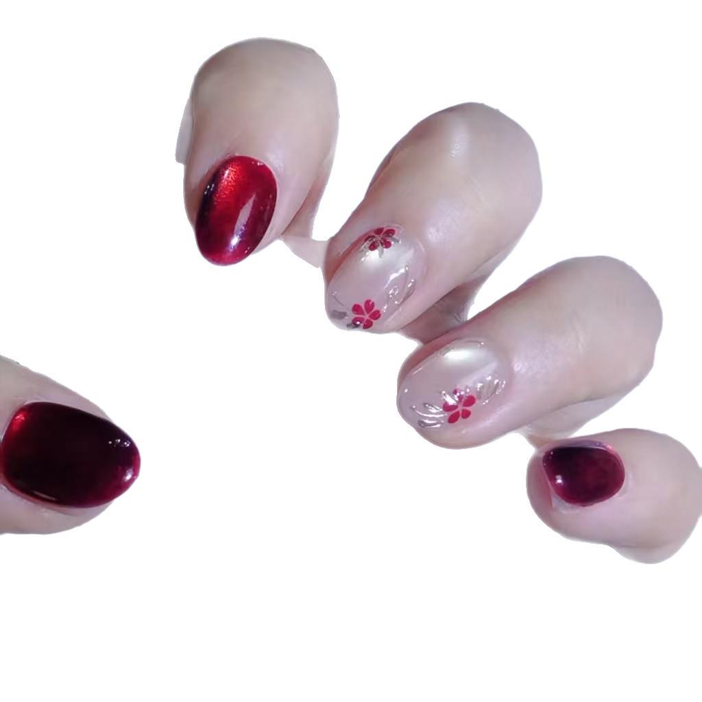 New Year Ruby Cat Eye Press-On Nails: Hand-Painted Plum Blossom, Elegant Skin-Whitening Short Nails