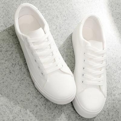 Scarpe bianche in pelle da donna primavera versatili scarpe bianche nuove traspiranti leggere suola morbida bianco puro scarpe da ginnastica da studente scarpe da uomo