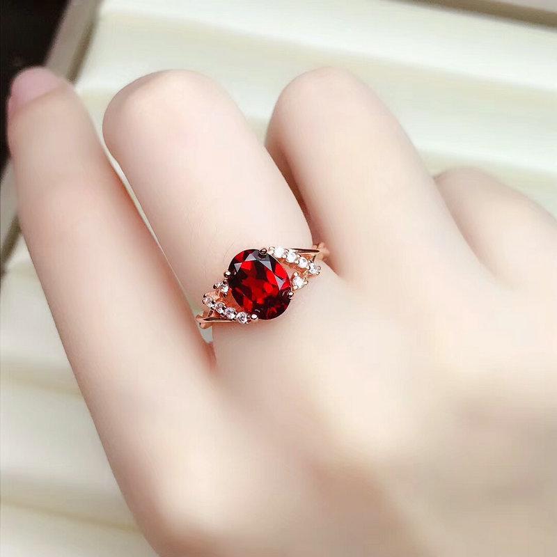 

Trendy Women s Imitation Ruby Oval Cross Open Ring Rose Gold Precision Craft
