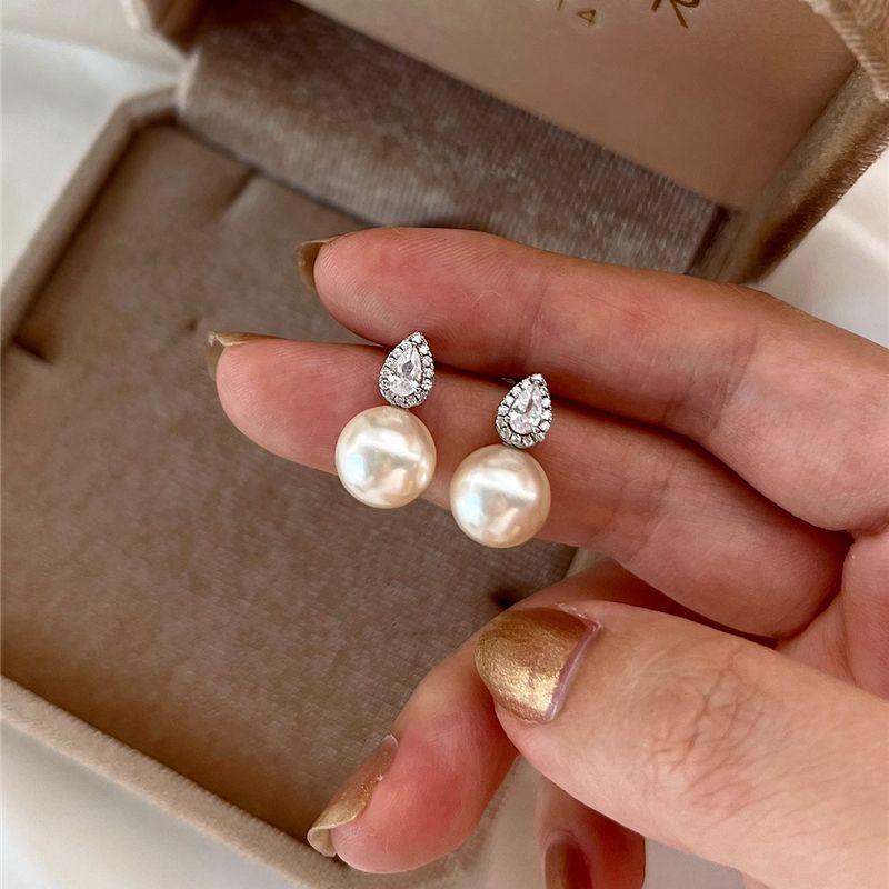 

Руди в дикой природе Серьги-пусеты с бриллиантами каплевидной формы и жемчугом Шицзя Циркон Доступная роскошь Модные серьги Нежные темпераментные серьги Pair of pearls with diamond drops