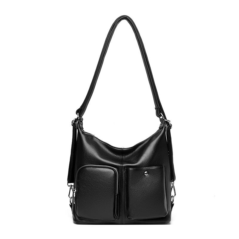 Die Retro-Umhängetasche aus weichem Leder ist eine modische Pendler-Einzelschultertasche, die schlicht und leicht ist.