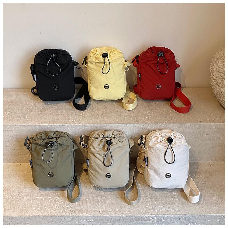 Women's Lightweight Crossbody Nylon Bag for Sports and Bottles