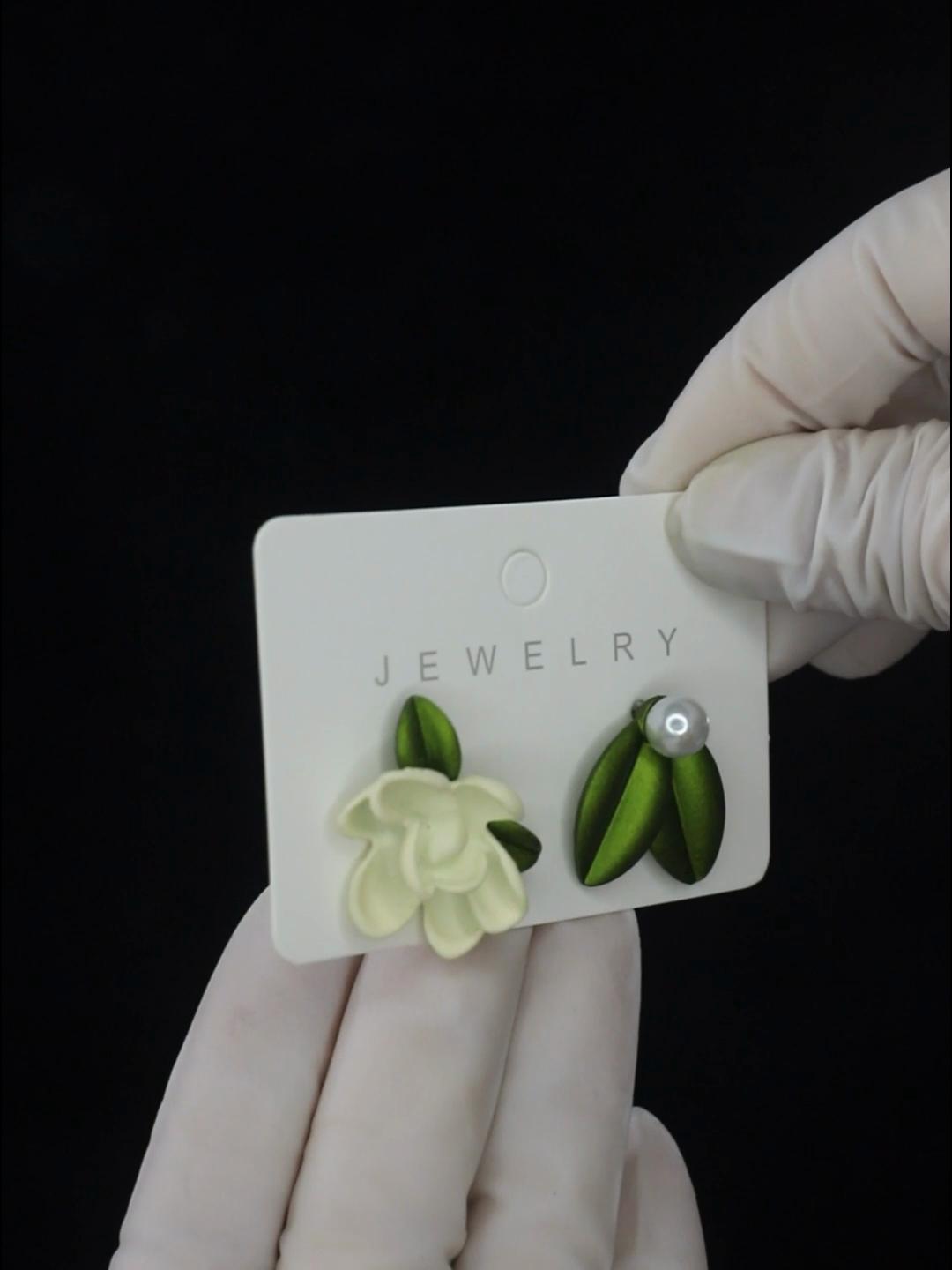 

Romantic Korean Gardenia Asymmetrical Stud Earrings Light Luxury White Flower Green Leaf Earring for… More