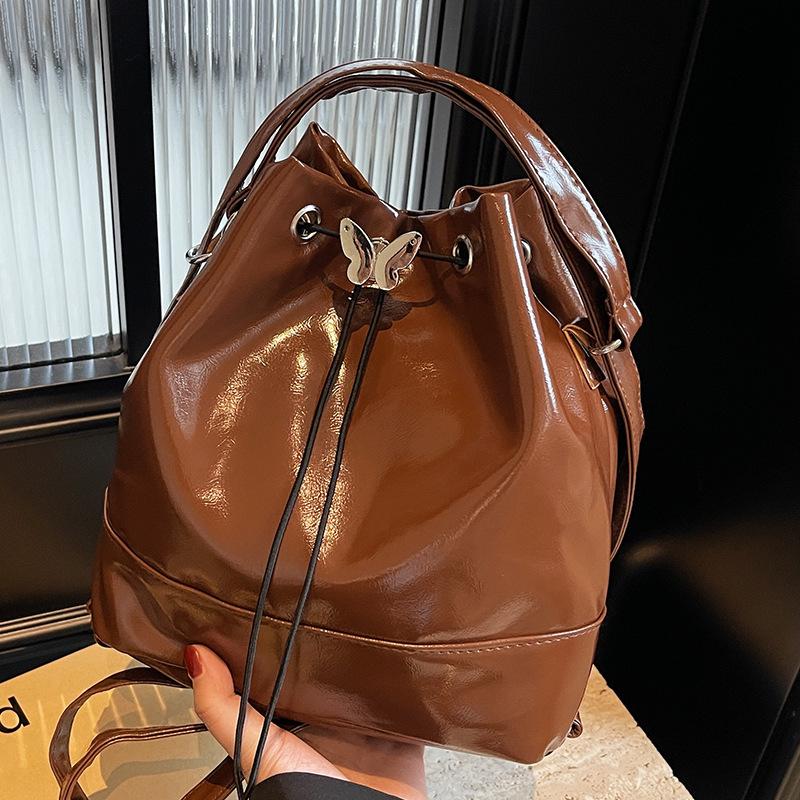 

Высококачественный нишевый рюкзак для женщин, новый стиль, рюкзак в стиле колледжа, простая сумка-ведро на одно плечо