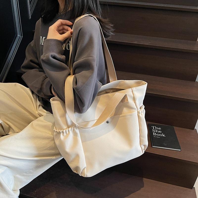 Simple canvas bag Women's tote bag Large capacity commuting Simple leisure College student work Shoulder bag Underarm bag