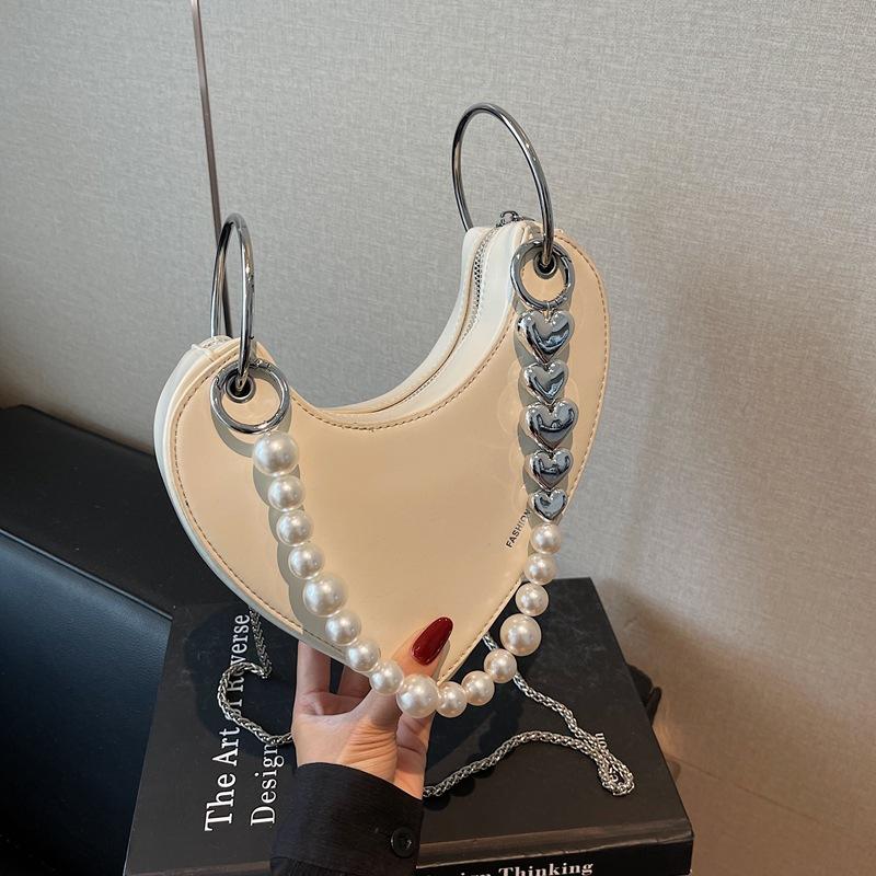 Niche design bag women's new summer chain messenger bag peach heart bag