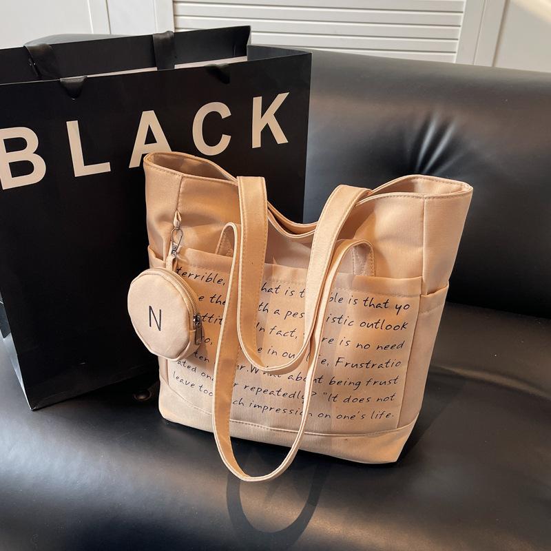 

Canvas bag women s large capacity 2025 new work portable shoulder college student class cloth bag commuter tote bag хаки