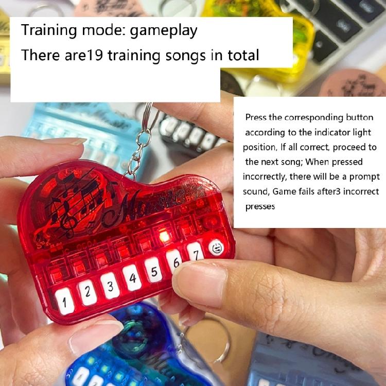 Piano eletrônico de bolso em formato de chaveiro, com teclas iluminadas multicoloridas, dispositivo portátil para aprendizado musical infantil.