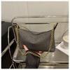 2025 new holiday style straw weaving women's summer popular weaving seaside beach large capacity chain shoulder tote bag