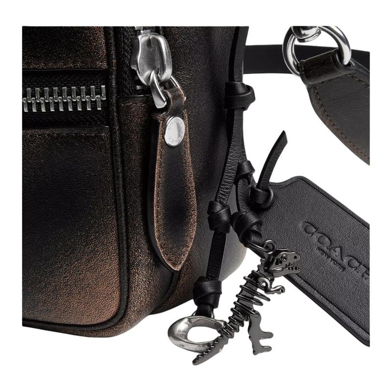 Coach Borsa a tracolla DAKOTACrossbody 24 chiusura a cerniera retrò tracolla staccabile design compatto ciondolo dinosauro pelle di mucca taglia media da uomo