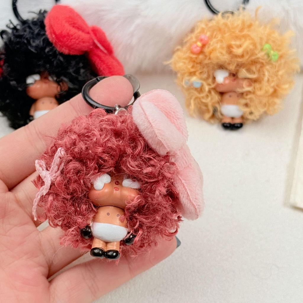Crying Doll Keychain with Wig & Bow - Creative Cartoon Pendant for Bags & Phones