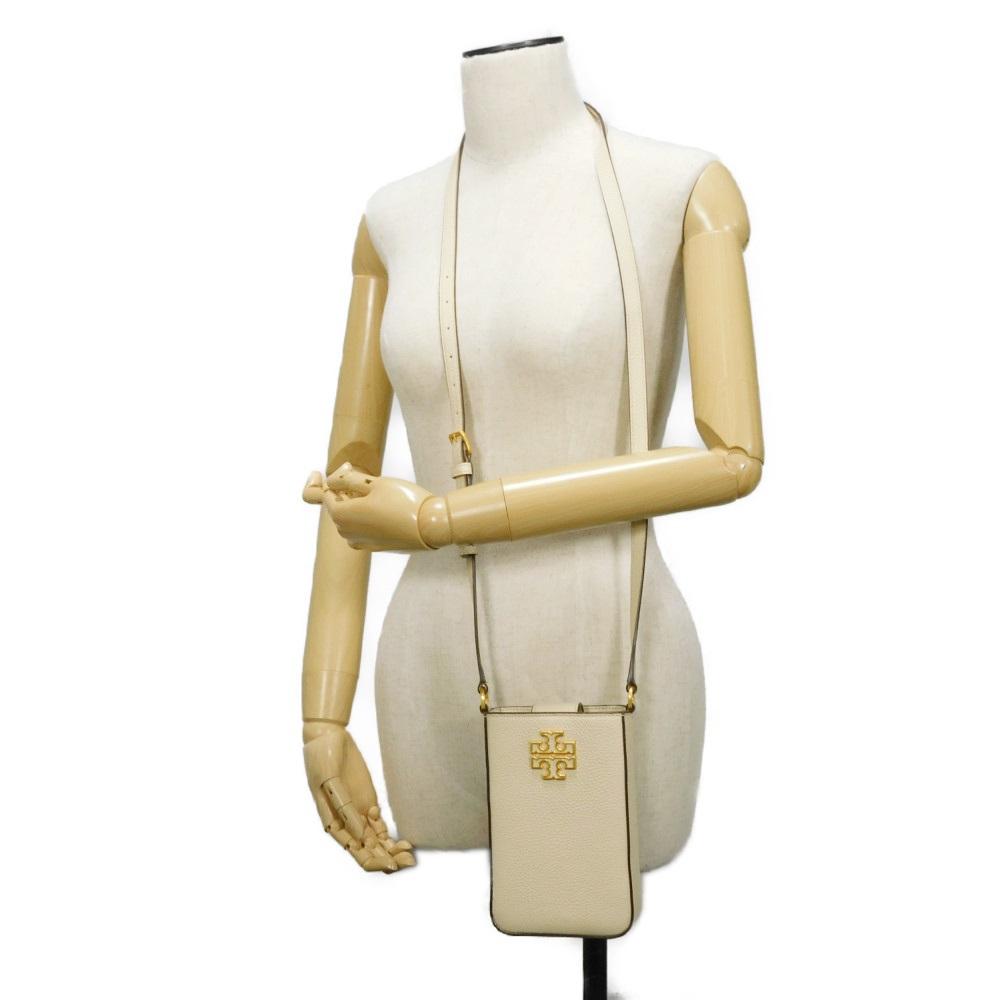 Used 10833 Britten Phone Crossbody 141000 122 7921 Ivory Pochette with Double T Logo in New Cream, Unisex from Japan