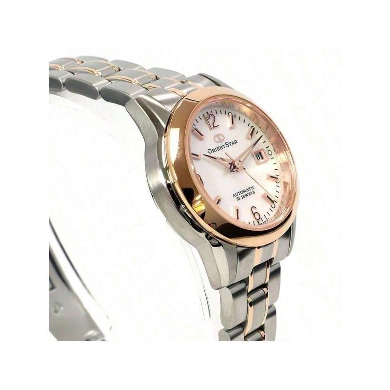 Oriental Automatic Mechanical Watch from featuring dial, mother-of-pearl dial Oriental mother-of-pearl numeral markers/stainless steel GOLD-TONE