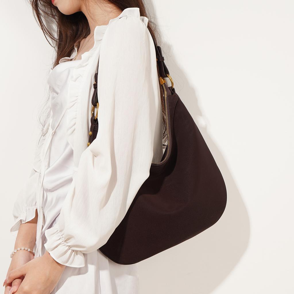 Niche design new retro texture cowhide bag underarm hand carry temperament casual lazy wind large capacity dumpling bag