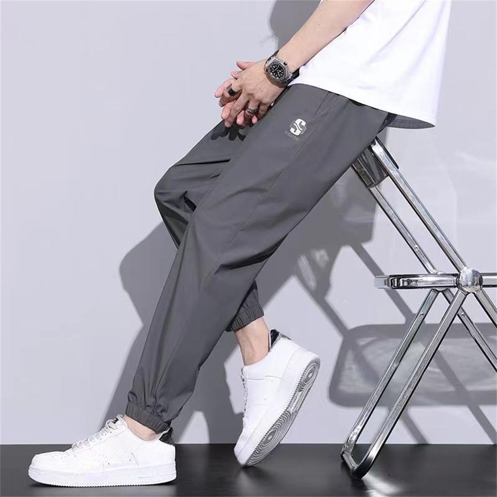 

Брюки из ледяного шелка, мужские модные брендовые свободные брюки с завязками, спортивные быстросохнущие летние тонкие дышащие укороченные повседневные брюки XL темно серый