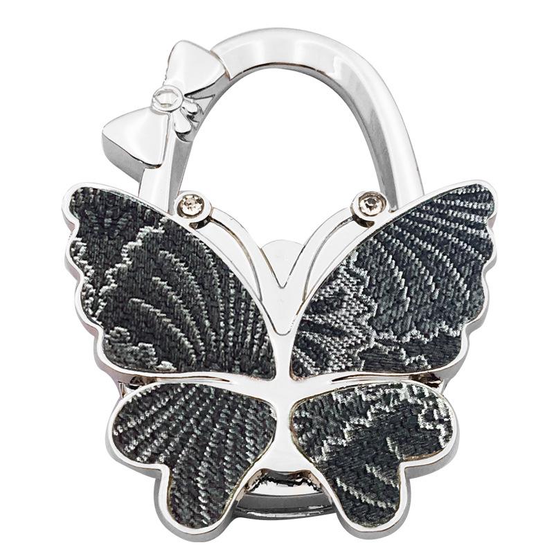 Large Matte Butterfly Hanging Bag Hook - Foldable Women's Bag Buckle & Portable Table Edge Hook for Luggage Accessories.