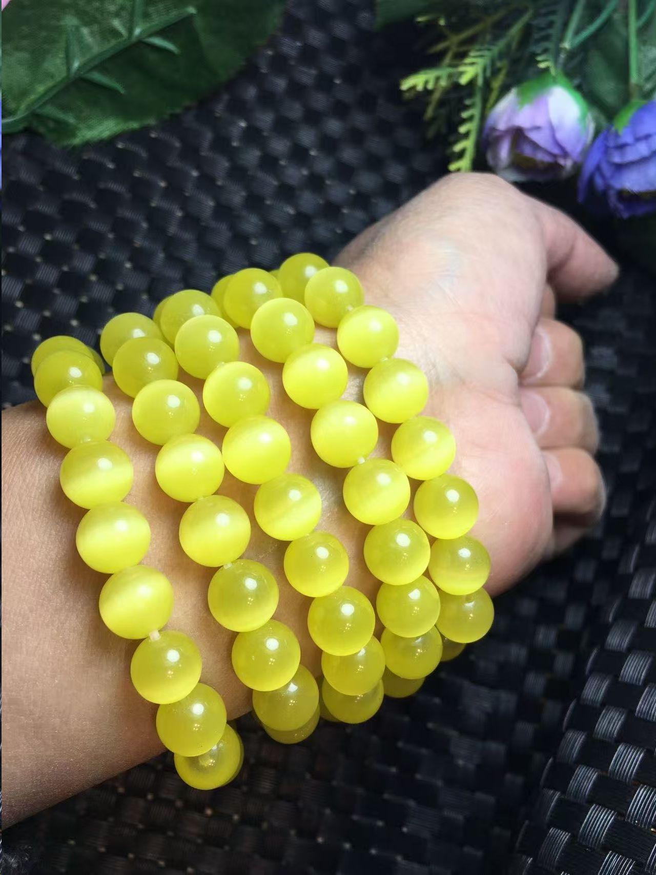 Purple and Yellow Crystal Beaded Holiday Bracelet with Garnet Accents