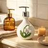 Sink Side Soap Pump Bottle with White Body and Flower Pattern for Bathroom Sink Use, Guest Bath Placement, and Hand Wash Bottle Access