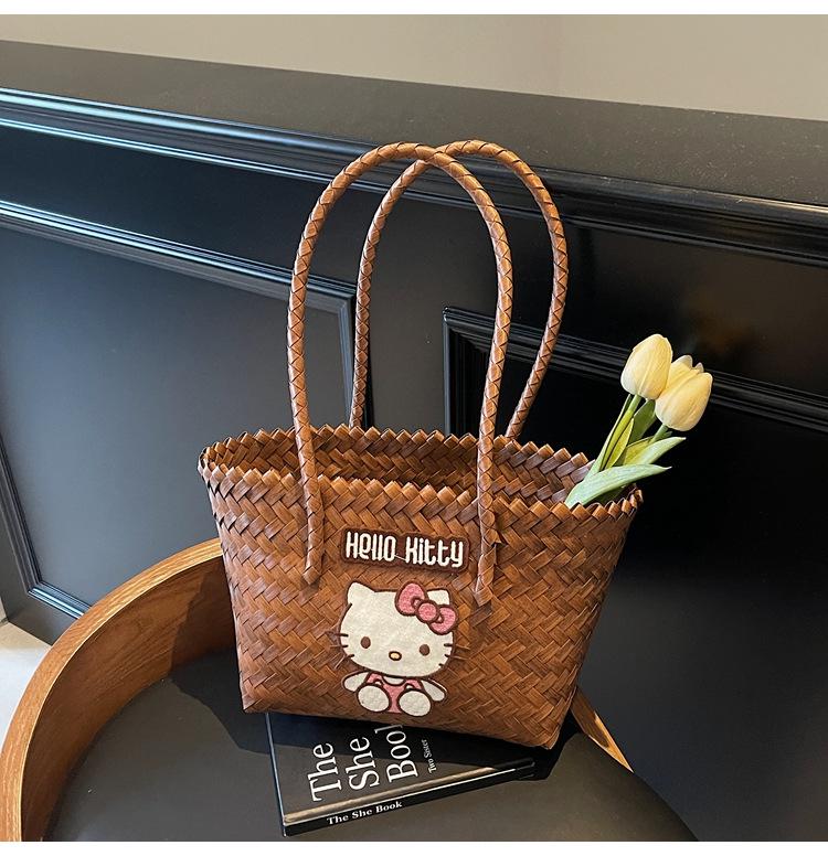 Cartoon KT Cat Rattan Beach Bag: Women's Summer Handheld Woven Basket for Seaside Holiday Commute
